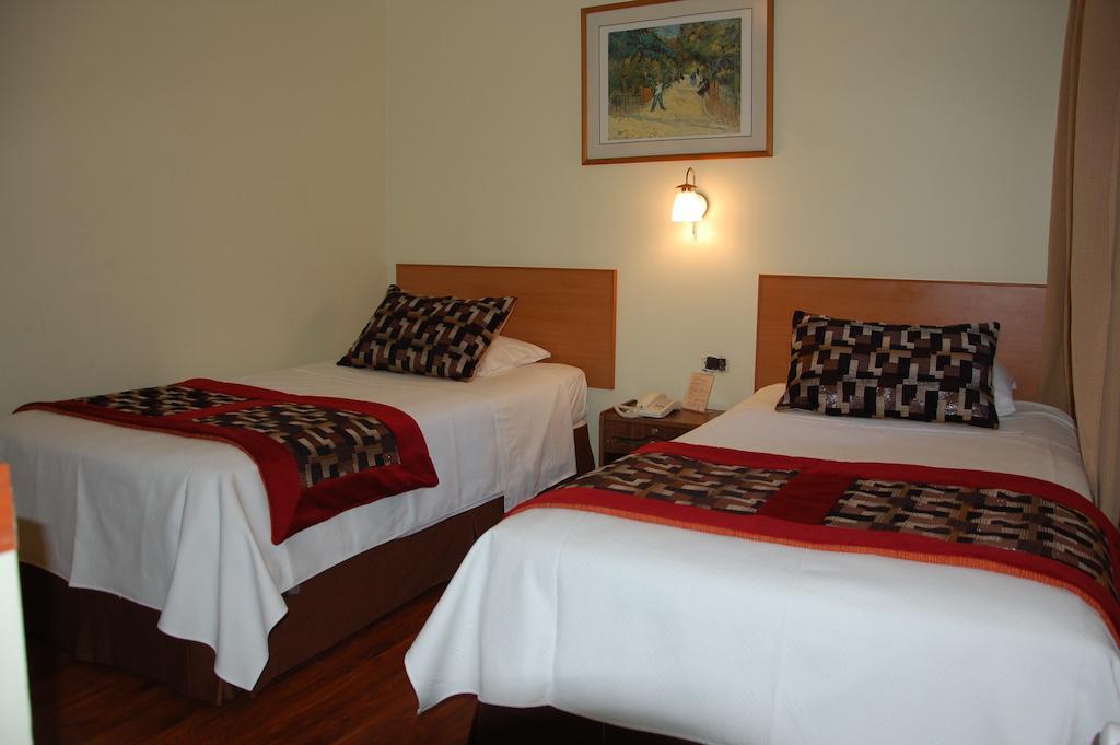 Hotel Plaza Concepción Zimmer foto